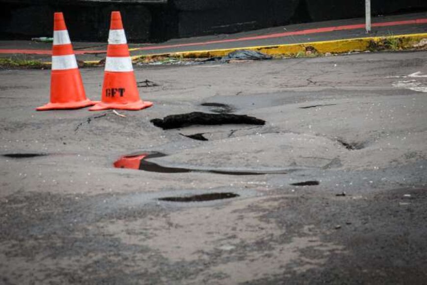 Asfalto 'vira onda' após temporal em Campo Grande