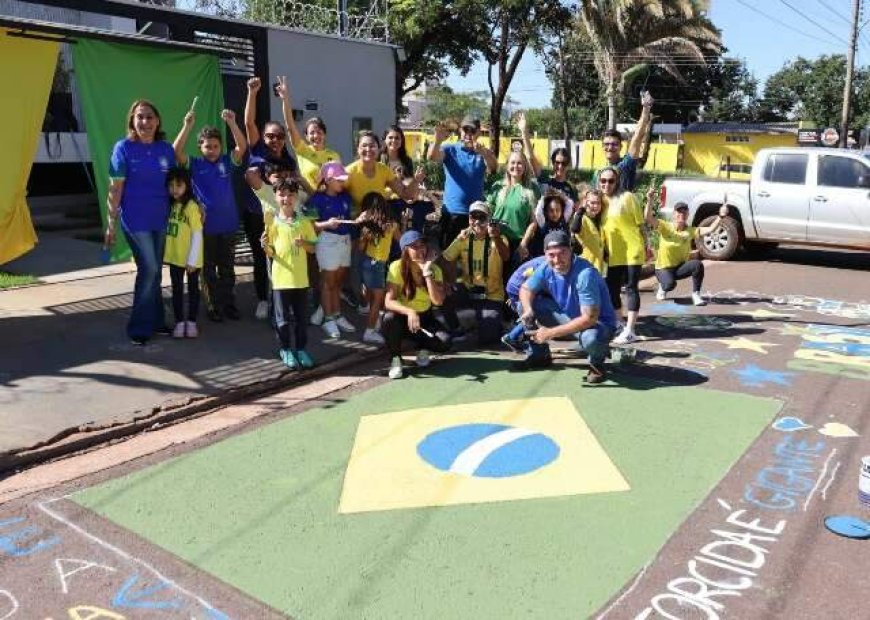 Famílias se Reúnem para Pintar Rua e Manter Tradição Viva durante a Copa do Mundo